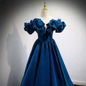 Luxurious blue satin evening dress with classic princess silhouette and radiant finish