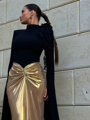 Fashion-forward pleated bodycon dress with long sleeves and contrast design for classy event styling