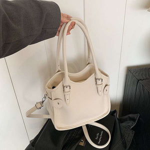 All-match PU leather handbag with adjustable strap and structured shape for travel and casual wear