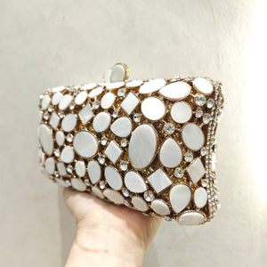 Gold shell clutch handbag embellished with full diamond crystal detailing