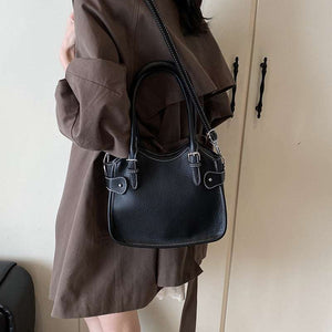 All-match PU leather handbag with adjustable strap and structured shape for travel and casual wear