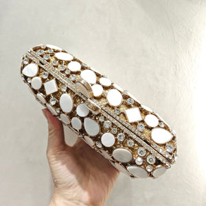 Gold shell clutch handbag embellished with full diamond crystal detailing