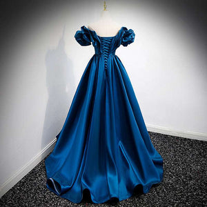 Luxurious blue satin evening dress with classic princess silhouette and radiant finish
