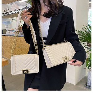 Modern structured messenger handbag with diamond chain strap ideal for parties and stylish daily outfits