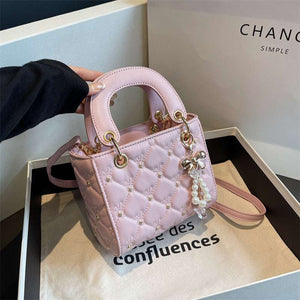 Stylish diamond embroidery polyester shoulder bag featuring intricate threadwork and a chic lightweight design