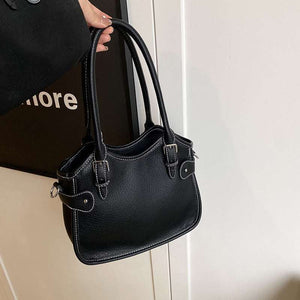 All-match PU leather handbag with adjustable strap and structured shape for travel and casual wear