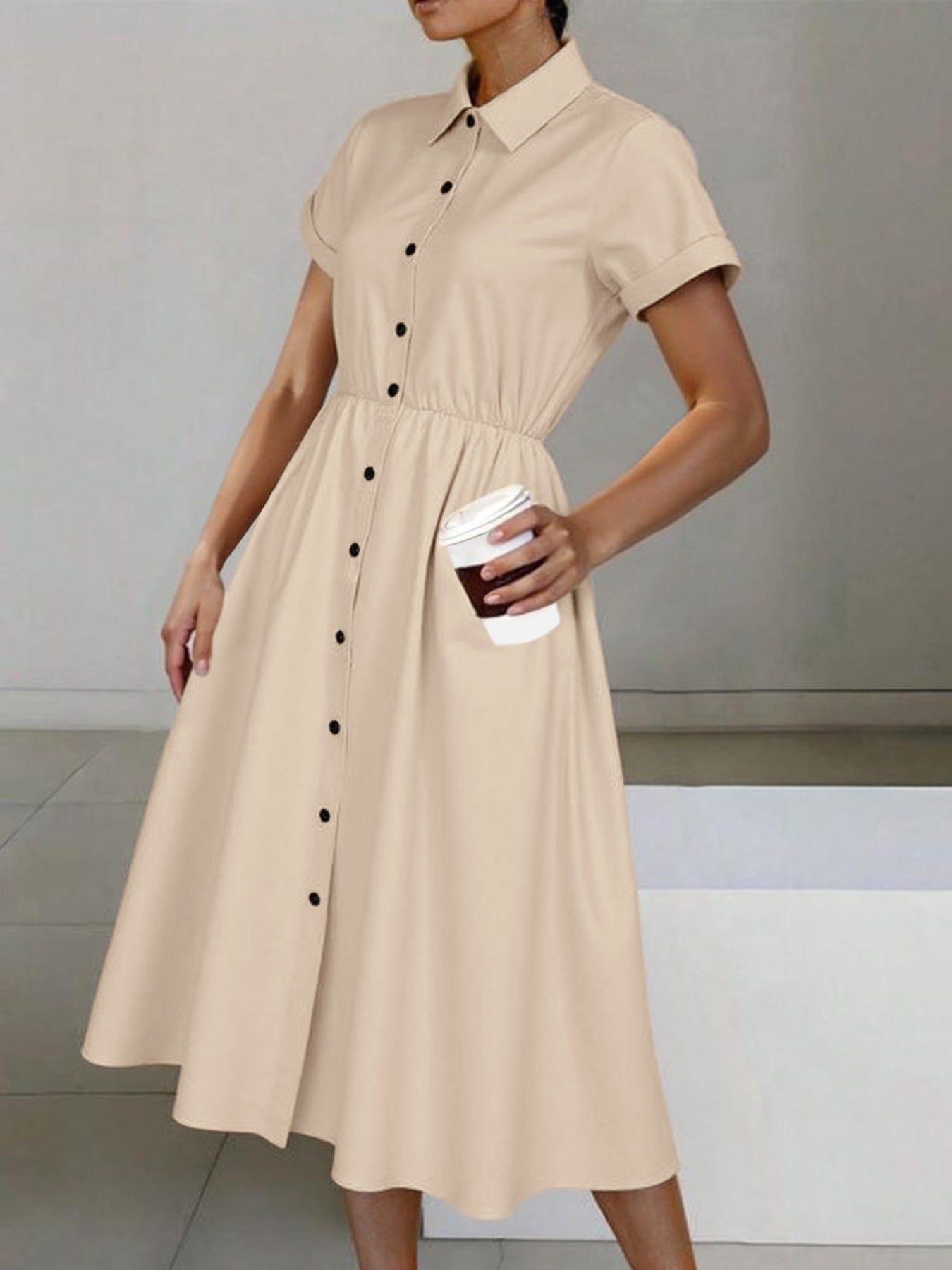 Light beige button-front midi dress with collar, short sleeves, waist tie, and pockets.