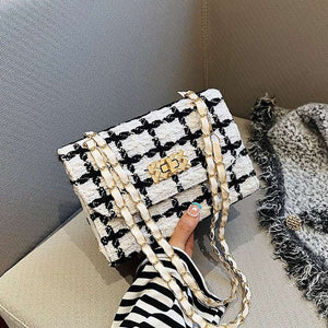 Fashionable woolen PU one shoulder bag with chain detail and compact structured silhouette for modern styling