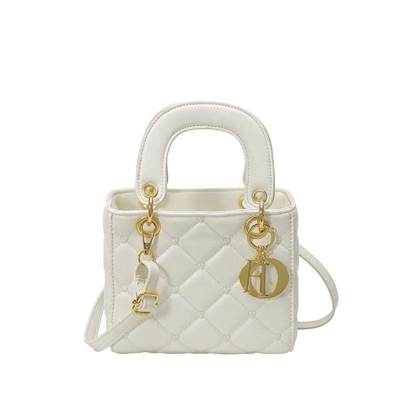 Stylish diamond embroidery polyester shoulder bag featuring intricate threadwork and a chic lightweight design