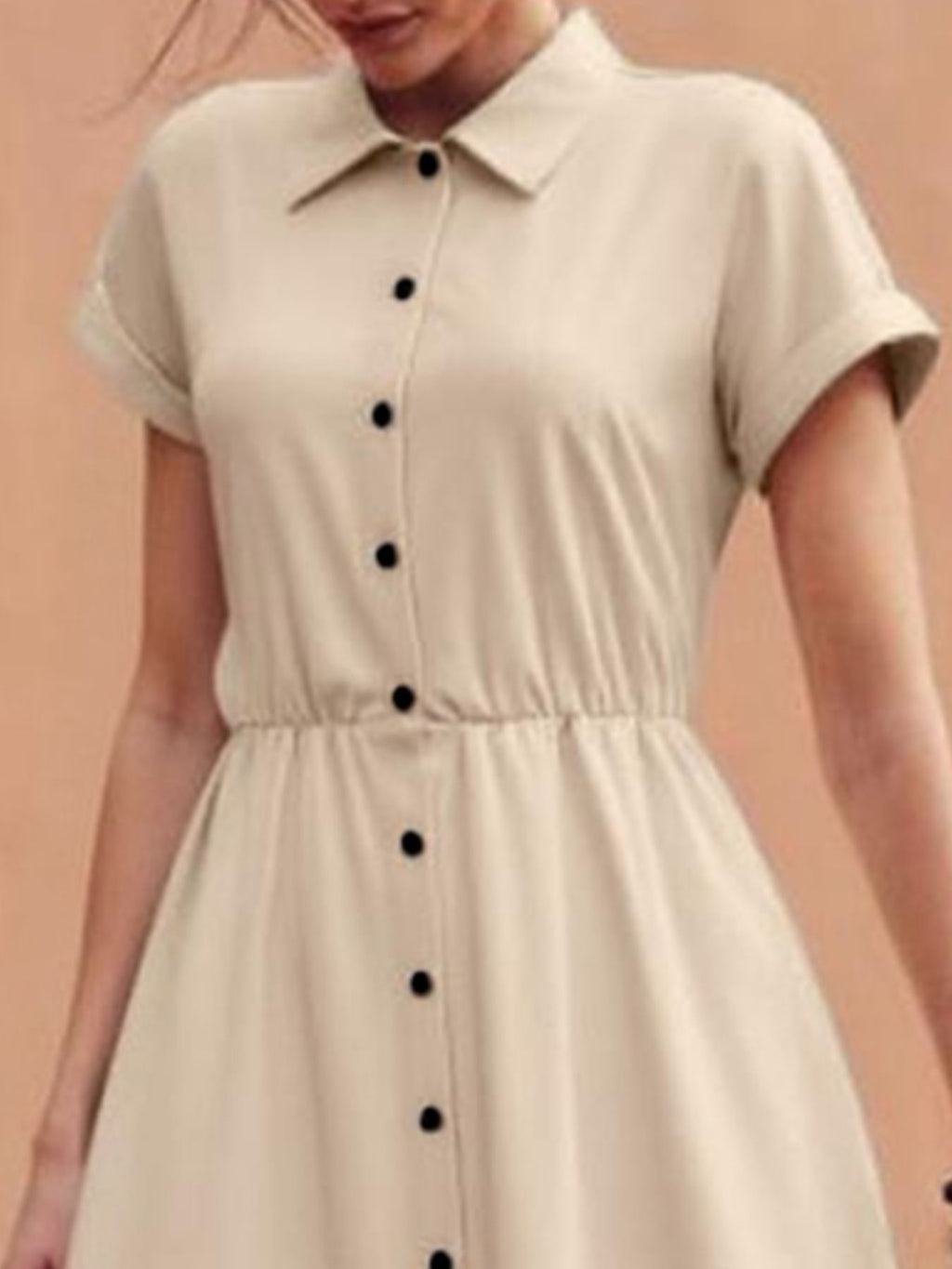 Light beige button-front midi dress with collar, short sleeves, waist tie, and pockets.