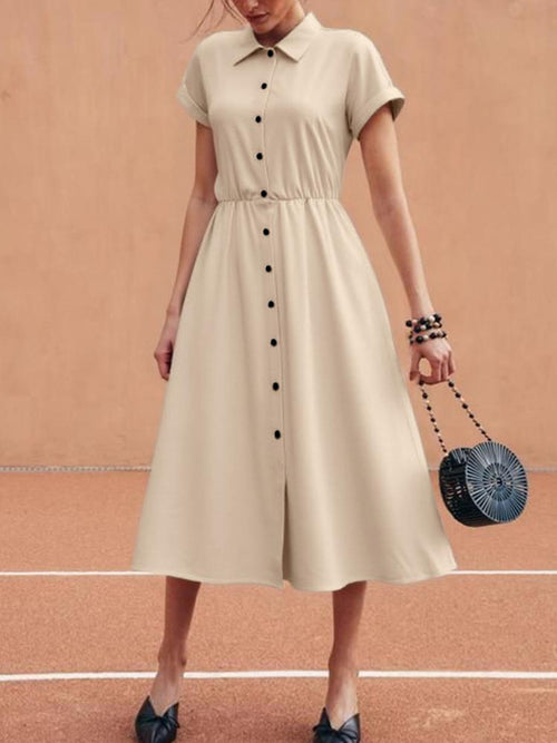 Light beige button-front midi dress with collar, short sleeves, waist tie, and pockets.