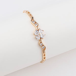 18K gold-plated butterfly clover copper bracelet with elegant charm design and polished finish