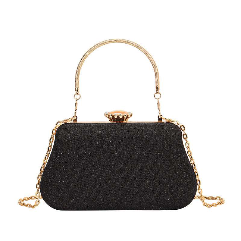 Trendy chain strap clutch handbag with structured form perfect for evening events and casual chic outfits