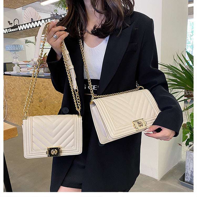 Modern structured messenger handbag with diamond chain strap ideal for parties and stylish daily outfits