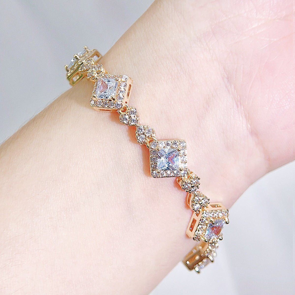 Luxury zircon women's bracelet featuring diamond-like shine and polished metal finish