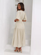Textured white surplice short sleeve midi dress