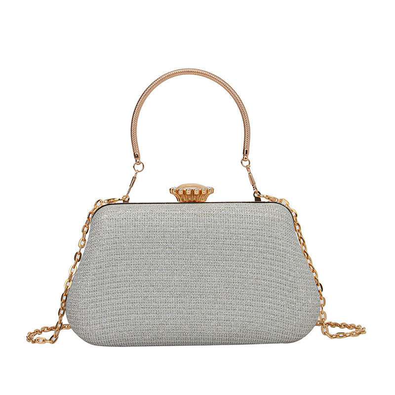 Trendy chain strap clutch handbag with structured form perfect for evening events and casual chic outfits