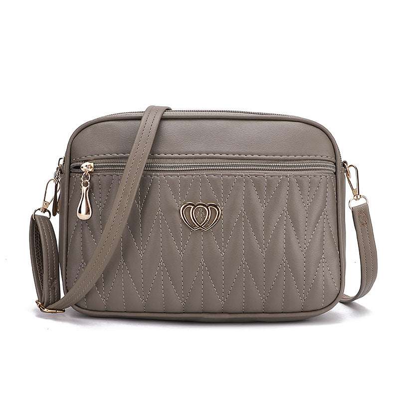 Stylish high-grade shoulder bag showcasing durable material and modern structured form for casual and formal outfits