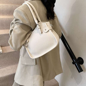 All-match PU leather handbag with adjustable strap and structured shape for travel and casual wear