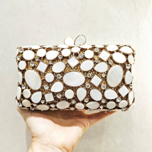 Gold shell clutch handbag embellished with full diamond crystal detailing