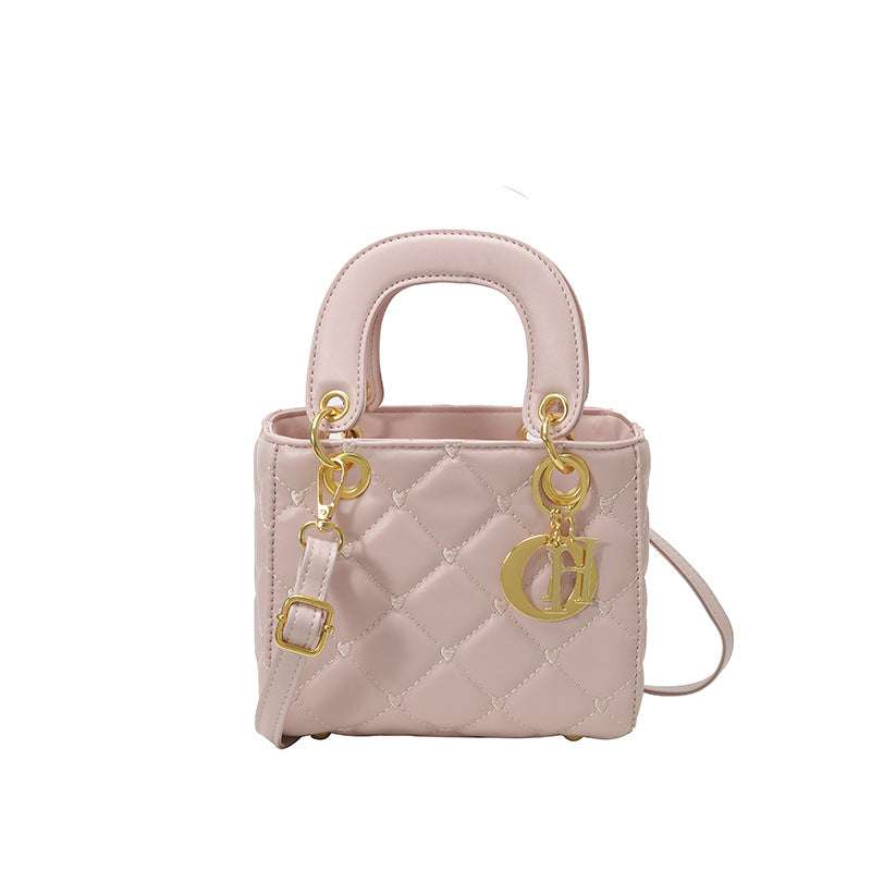 Stylish diamond embroidery polyester shoulder bag featuring intricate threadwork and a chic lightweight design